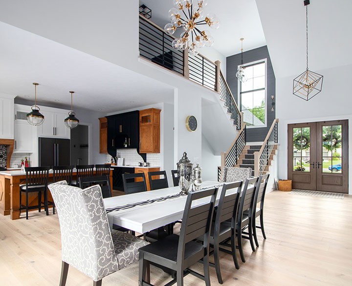 open concept entryway dining kitchen and living